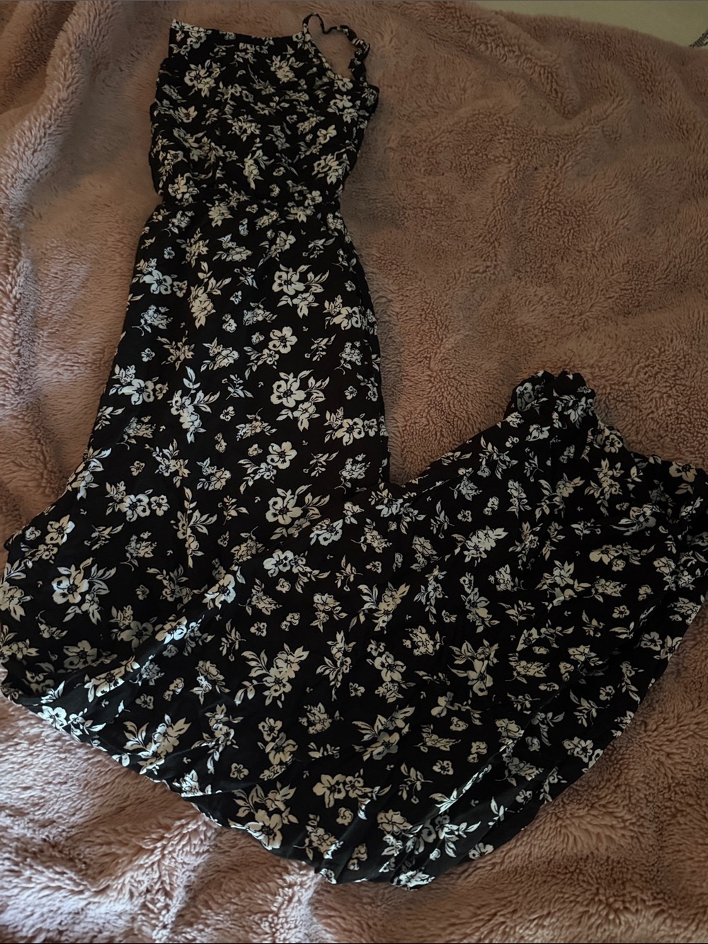 Black Floral pant length jumpsuit with White Blossom Print. Open back.